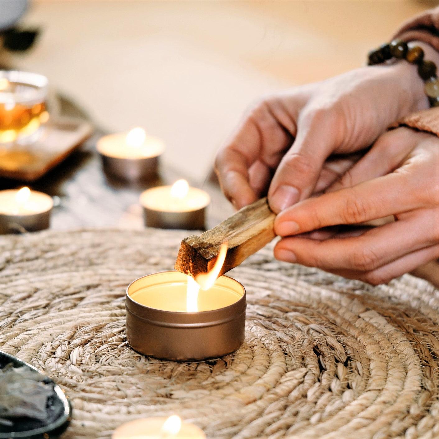 Palo Santo lighting with candle