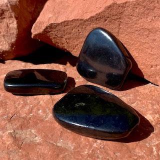 Shungite palmstones aligned for protection and energy balance