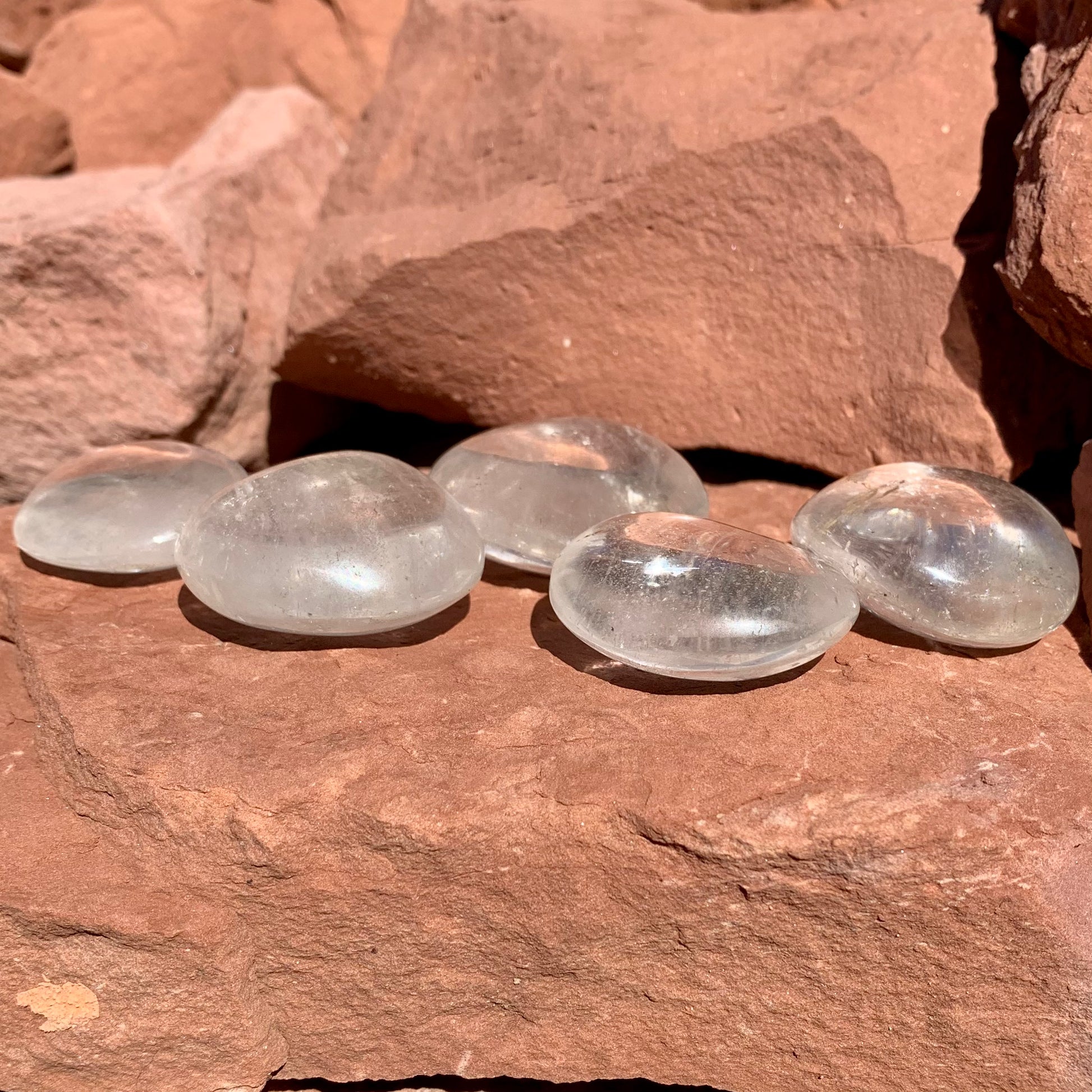 Clear Quartz palmstone polished for clarity and balance