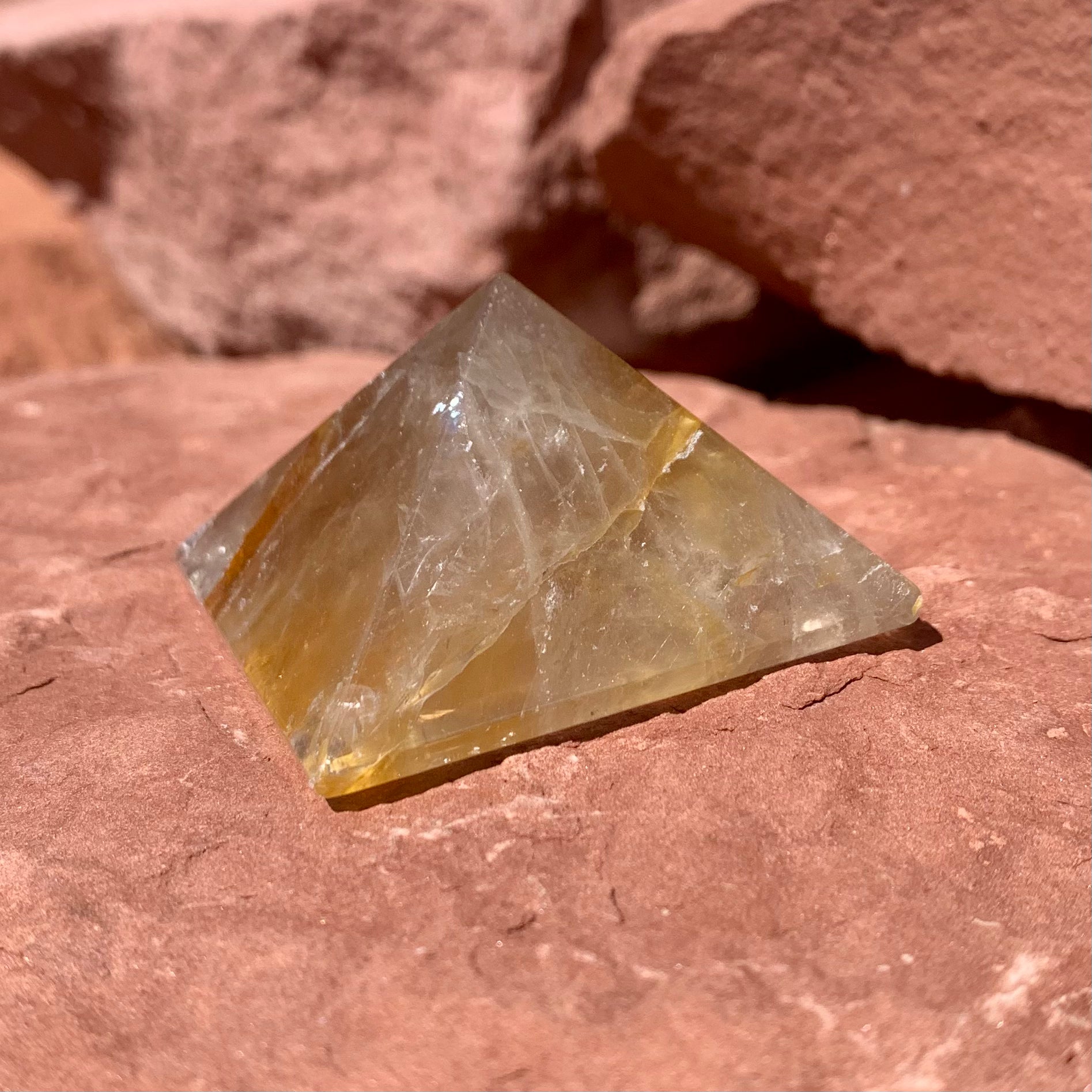 Golden Healer pyramid crystal radiating soft healing energy